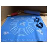 Baking  set. Rolling pins, mat, cookie cutters