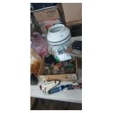 Legos, pink vase, computer parts, jug and home