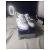 Women's size 7 Air Jordan 4 Retro New In