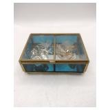Glass jewelry box with content