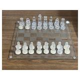 Glass chess board & pieces, one corner needs pad