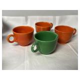 Fiesta teacups red orange and medium green, on