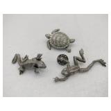 Animal pins marked JJ