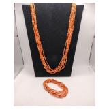 Multi-strands orange seed beaded necklace with