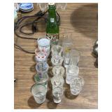 Different style shot glasses, some advertising, &