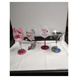 Group of four decorative martini glasses. Appear