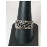 Silver design band ring marked 925 size 9    .115