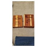 2 antique bibles with wooden boxes.