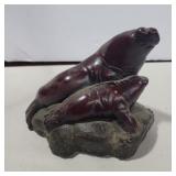 Boma carved seal figure 4in tall and 5in across