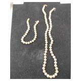 Pearl necklace and bracelet clasp marked 585