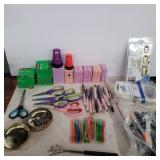 Tape, pens, scissors, rubber foil tape, hooks