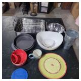 Roasting pans, cake pans, chip and dip bowlsand