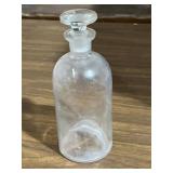 Glass apothecary bottle with stopper