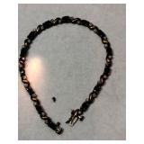 14k blue /clear Stone bracelet marked 14k.