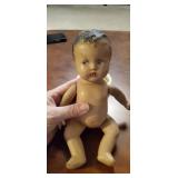 Very old doll. Peeing doll.