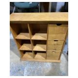 wooden cubby storage unit with three drawers. 18ï¿½