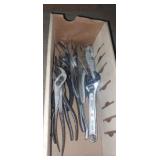 Pliers, adjustable wrench, channel locks and