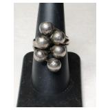Silver ball wrap around ring size 7.   .120oz