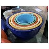 Fiesta nesting mixing bowls, white one has a chip