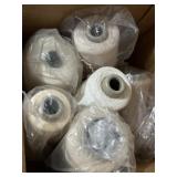 Spools of string and maybe cotton core for candle