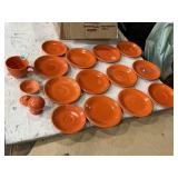 Mix of original red fiesta ware saucers, shaker