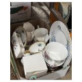 Mix of bone china teacups, saucers, plates, bell