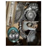Assorted silver-plate serving pieces and flatware