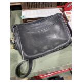 vintage Coach black leather crossbody bag.