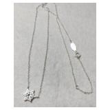 Silver snowflake necklace marked 925.     .065oz
