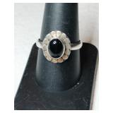 Silver black onyx ring marked 925 size 9.