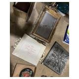Handled ornate framed mirror and other wall decor