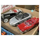 3 die-cast model cars