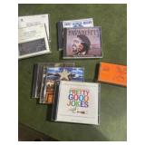 Collection of seven CDs and one cassette