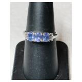 Silver purple stone ring Marked 925.   Size 7.