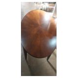 Oval top wooden coffee table