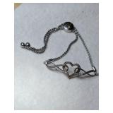 Silver heart adjustable bracelet marked 925.