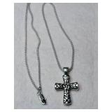 Silver chain cross pendant Marked 925.    .195oz