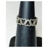 Silver heart-shaped band marked 925 size 5.