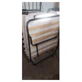 Folding bed with mattress