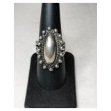 Silver adjustable ring size 7.   .205oz
