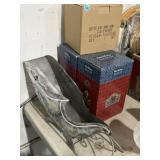 Metal Christmas sleigh and three Disney
