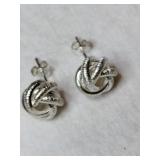 Silver not post earrings marked 925.    .115oz