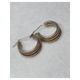 Silver small hoop earrings marked 925.    .060oz