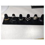 7 costume jewelry rings( stand not included)