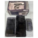 Collection of cell phones and a Vivitar power