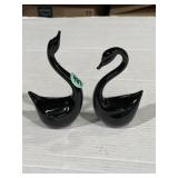 pair of black glass swan figurines