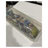Plastic container of unsearched baseball cards