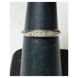 Gold Clear stone band ring marked  size 6.
