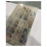 Plano storage container, full of doll accessories