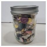 Glass jar of buttons quarts